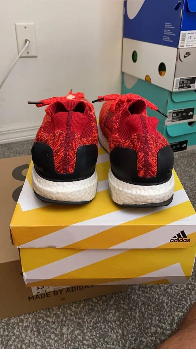 Adidas ultraboost uncaged solar red